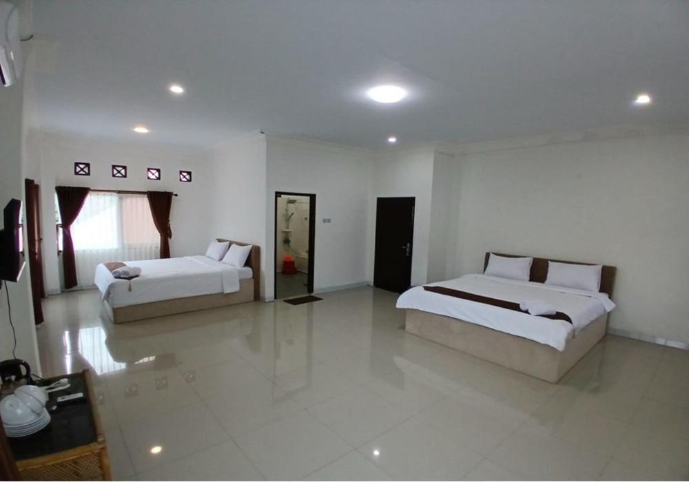 Hotel Pondok Putri Batukaras Habitación foto